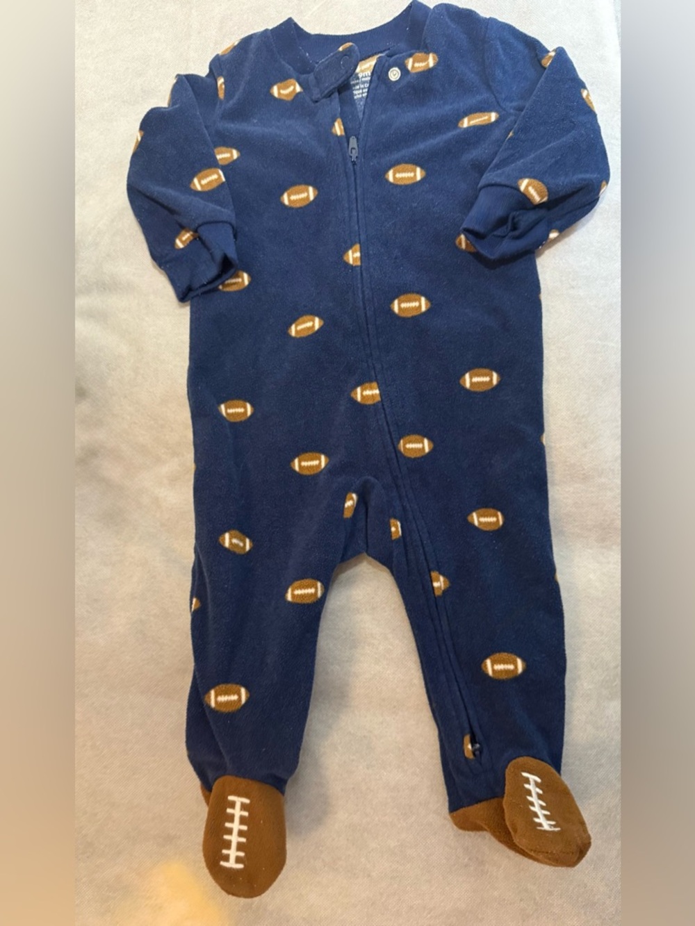 Carter's baby boy football-themed footed fleece pajama. 9mos